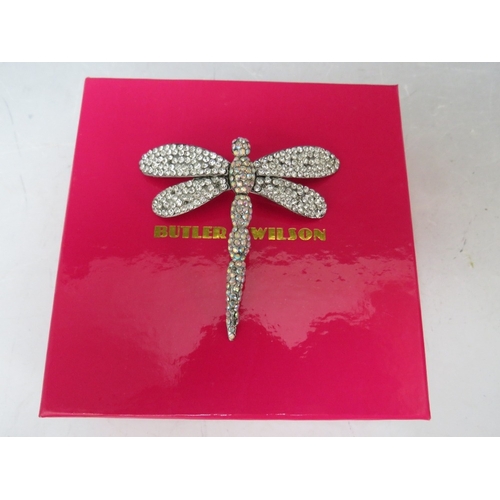 48 - A SELECTION OF BUTLER AND WILSON JEWELLERY, to include a dragonfly brooch - W 6.5 cm, a butterfly ha... 