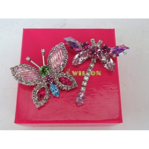 49 - A BUTLER AND WILSON SHOE THEME BRACELET AND EARRING SET, together with three butterfly theme brooche... 