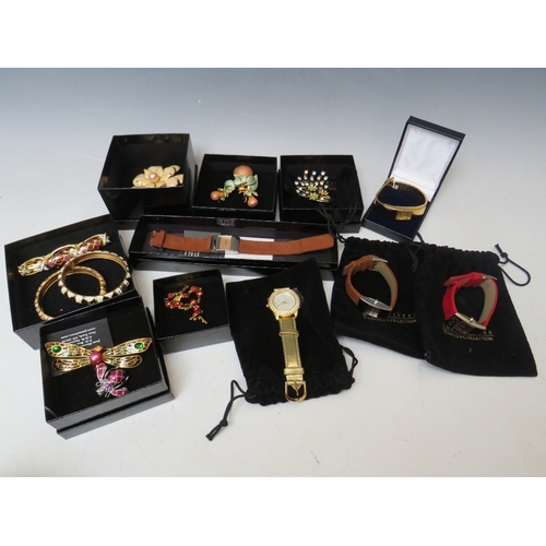 50 - A COLLECTION OF JOAN RIVERS JEWELLERY ITEMS, to include two gilt & enamel hinged bangles, a pear the... 