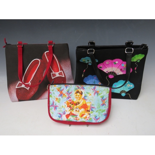 51 - A COLLECTION OF ASSORTED BUTLER AND WILSON HANDBAGS AND PURSES, to include B&W world items with imag... 