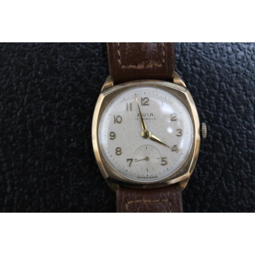 176 - AN AVIA 9 CARAT GOLD WRIST WATCH, Dia 3 cm