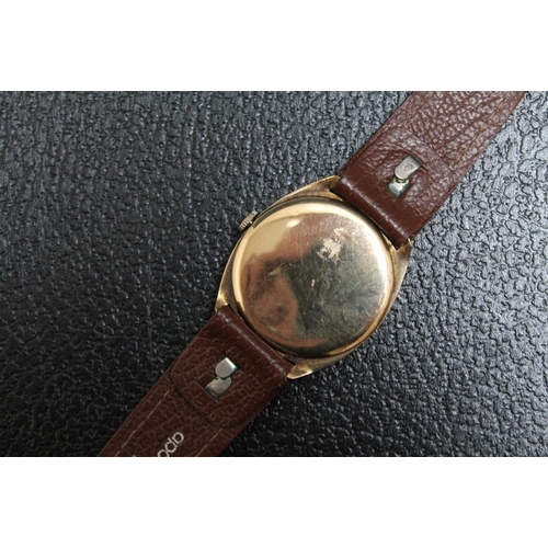 176 - AN AVIA 9 CARAT GOLD WRIST WATCH, Dia 3 cm