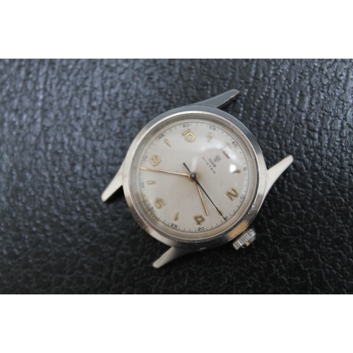 180 - A TUDOR OYSTER WRIST WATCH BY ROLEX, no strap, back case numbered 8880 4453, Dia 3.5 cm