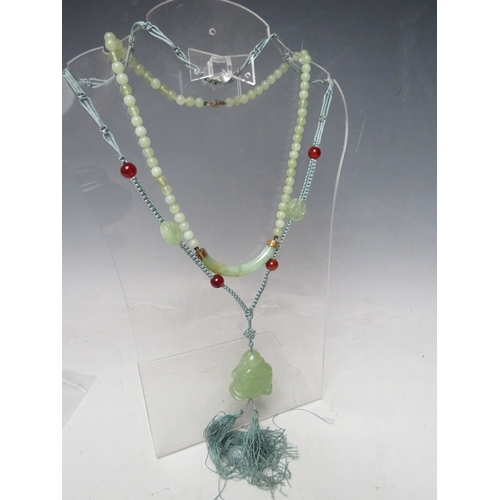 63 - A MODERN JADE BEAD NECKLACES WITH YELLOW METAL MOUNTS, the clasp marked 9K, together with a modern j... 