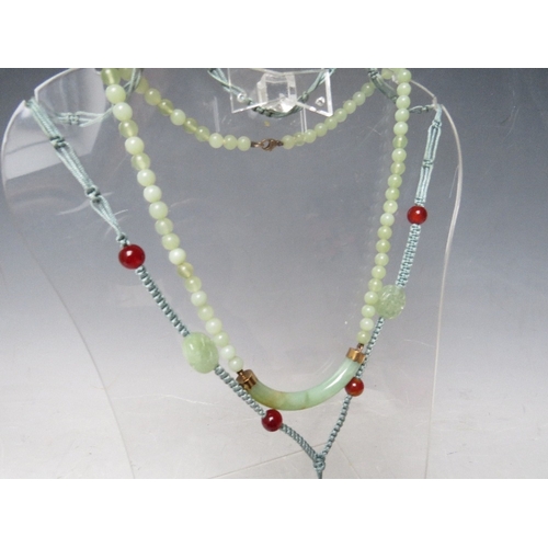 63 - A MODERN JADE BEAD NECKLACES WITH YELLOW METAL MOUNTS, the clasp marked 9K, together with a modern j... 