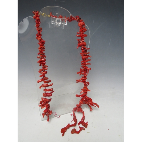 64 - A VINTAGE GRADUATED CORAL BRANCH NECKLACE, with gilt metal mounts, for re-stringing / restoration