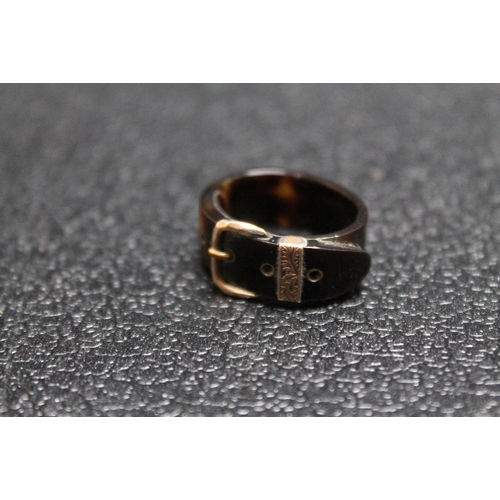 75 - AN UNUSUAL NOVELTY TORTOISESHELL RING IN THE FORM OF A BUCKLE, please note ring is oval in shape