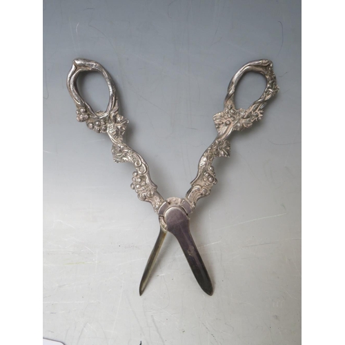 133 - A PAIR OF 19TH CENTURY GILT SUGAR NIPS, together with a silver plated pair of grape scissors (2)