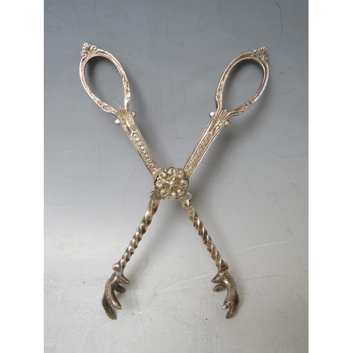 133 - A PAIR OF 19TH CENTURY GILT SUGAR NIPS, together with a silver plated pair of grape scissors (2)