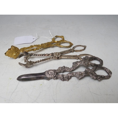 133 - A PAIR OF 19TH CENTURY GILT SUGAR NIPS, together with a silver plated pair of grape scissors (2)