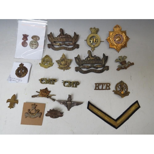221 - A COLLECTION OF MILITARY BADGES
