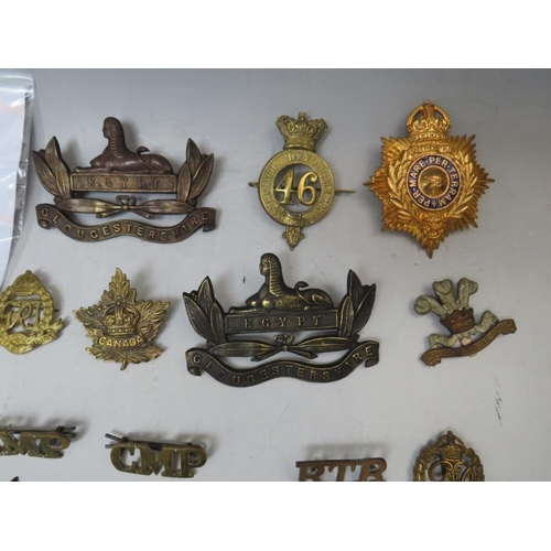 221 - A COLLECTION OF MILITARY BADGES