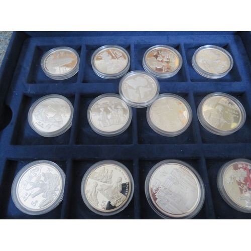 145 - CHINA - A COLLECTION OF MODERN SILVER PROOF 5 AND 10 YUAN COINS, in a blue presentation box (25 coin... 