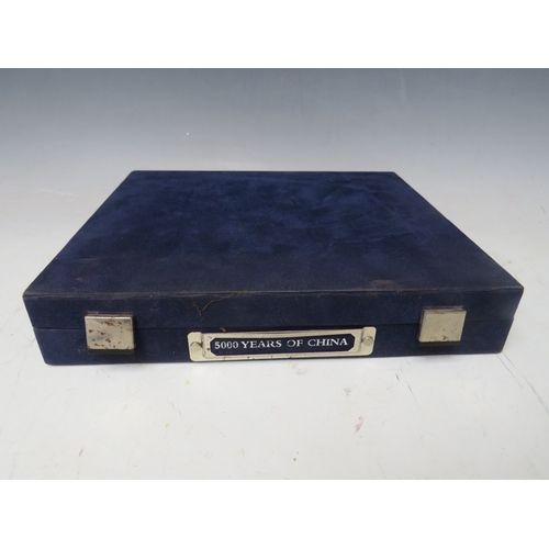 145 - CHINA - A COLLECTION OF MODERN SILVER PROOF 5 AND 10 YUAN COINS, in a blue presentation box (25 coin... 