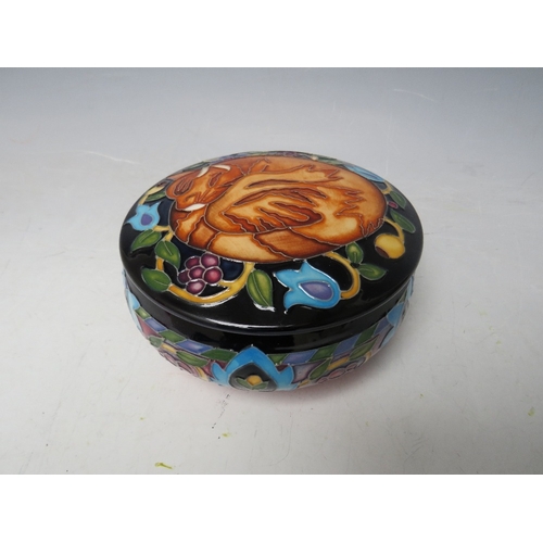 183 - A MOORCROFT TRIAL CIRCULAR POWDER BOWL AND COVER, Dia. 12.5 cm