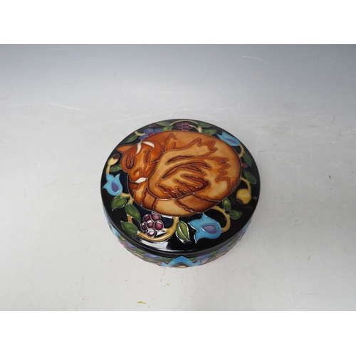183 - A MOORCROFT TRIAL CIRCULAR POWDER BOWL AND COVER, Dia. 12.5 cm