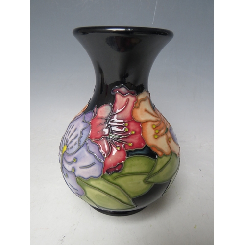 188 - A MOORCROFT TRIAL FLORAL PATTERN GLOBULAR VASE, H 16 cm