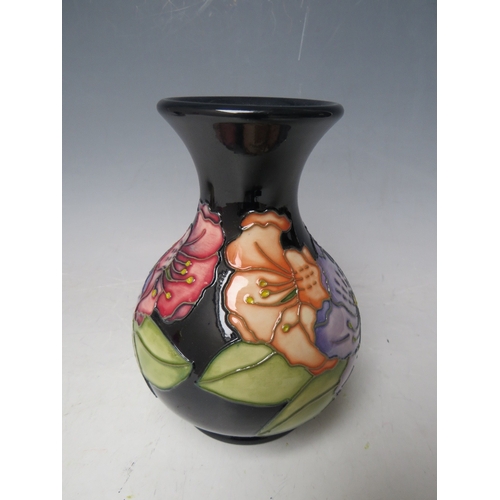 188 - A MOORCROFT TRIAL FLORAL PATTERN GLOBULAR VASE, H 16 cm