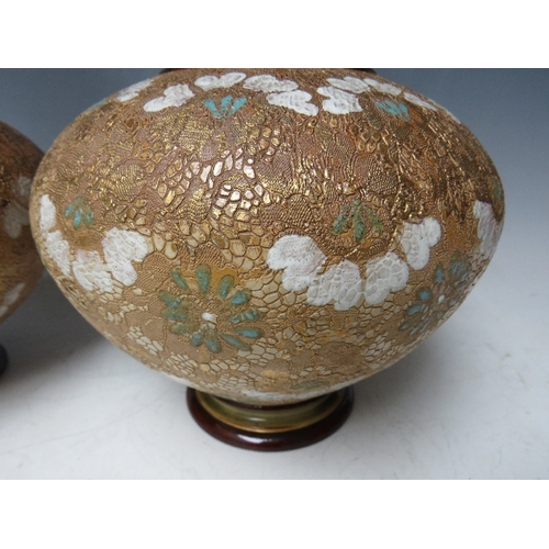 190 - A PAIR OF LARGE ROYAL DOULTON LAMBETH VASES, each decorated with tubelined and painted floral detail... 