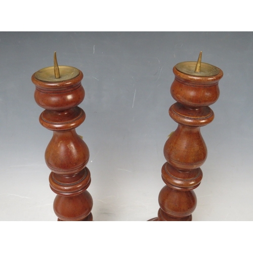 205 - A PAIR OF 19TH CENTURY TURNED WALNUT PRICKET CANDLESTICKS, H 32 cm