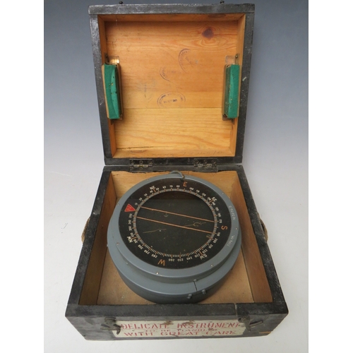 210 - A MILITARY COMPASS TYPE P4, in wooden case