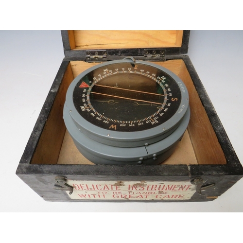 210 - A MILITARY COMPASS TYPE P4, in wooden case