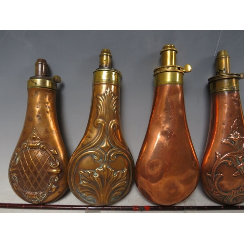 215 - FIVE 19TH CENTURY COPPER AND BRASS SHOT FLASKS, average L 20 cm