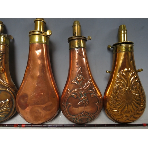 215 - FIVE 19TH CENTURY COPPER AND BRASS SHOT FLASKS, average L 20 cm