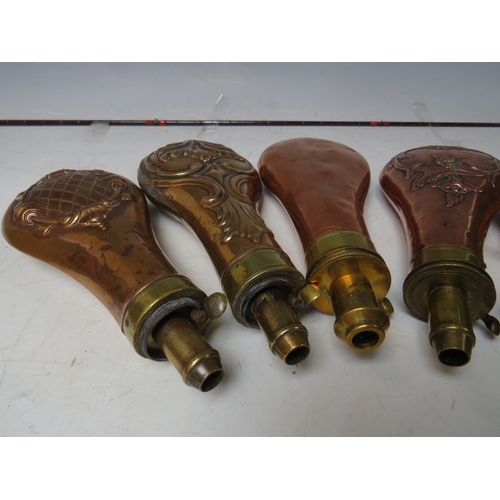 215 - FIVE 19TH CENTURY COPPER AND BRASS SHOT FLASKS, average L 20 cm