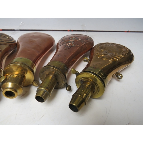 215 - FIVE 19TH CENTURY COPPER AND BRASS SHOT FLASKS, average L 20 cm