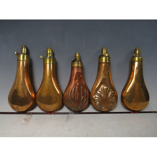 216 - FIVE 19TH CENTURY COPPER AND BRASS SHOT FLASKS, average L 19 cm