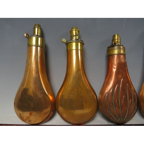 216 - FIVE 19TH CENTURY COPPER AND BRASS SHOT FLASKS, average L 19 cm