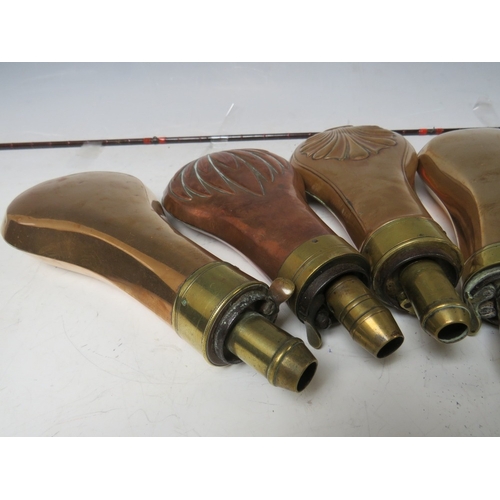 216 - FIVE 19TH CENTURY COPPER AND BRASS SHOT FLASKS, average L 19 cm