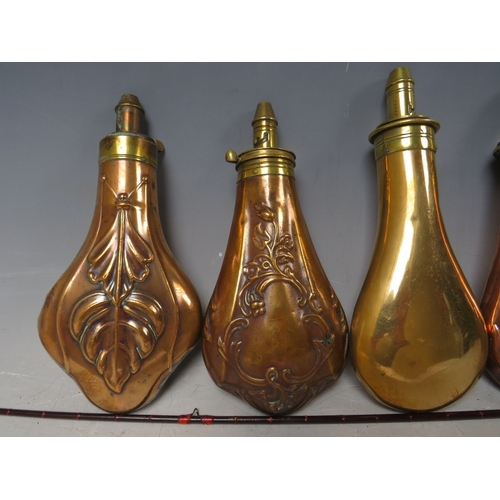 217 - FIVE 19TH CENTURY COPPER AND BRASS SHOT FLASKS, average L 19 cm