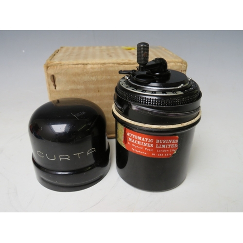 230 - A BOXED METAL CASED CURTA CALCULATOR