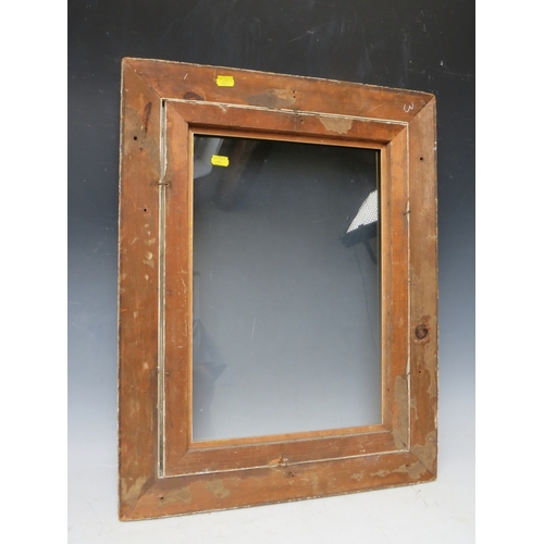 26 - A 19TH CENTURY GOLD FRAME, with gold slip and outer leaf design, glazed, with some restoration, fram... 