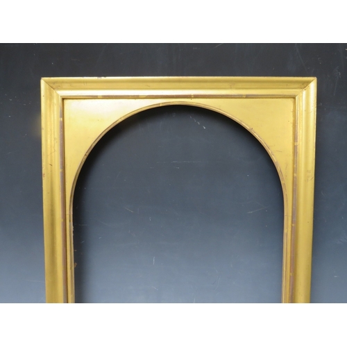 27 - A 19TH CENTURY GOLD FRAME, with arched gold slip, frame W 3 cm, slip rebate 54 x 35 cm, frame rebate... 