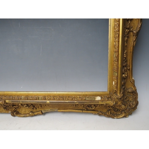 29 - A 19TH CENTURY DECORATIVE GOLD SWEPT FRAME, with gold slip, frame W 8 cm, slip rebate 45 x 60, frame... 