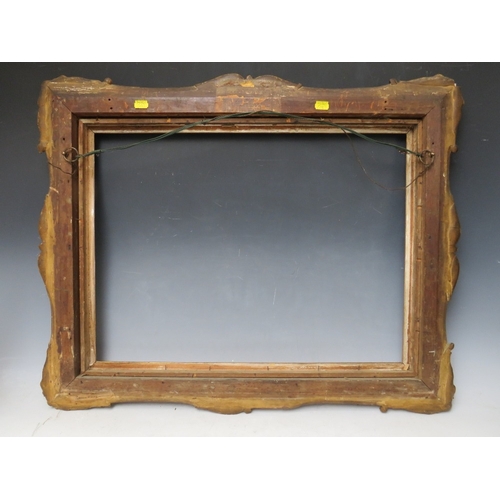 29 - A 19TH CENTURY DECORATIVE GOLD SWEPT FRAME, with gold slip, frame W 8 cm, slip rebate 45 x 60, frame... 