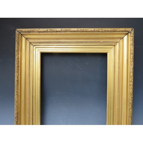 30 - A 19TH CENTURY GOLD FRAME, with acanthus leaf design to outer edge and gold slip, frame W 8 cm, slip... 