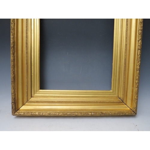 30 - A 19TH CENTURY GOLD FRAME, with acanthus leaf design to outer edge and gold slip, frame W 8 cm, slip... 