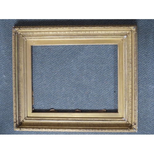 31 - A 19TH CENTURY DECORATIVE GOLD FRAME, with gold slip, frame W 9 cm, slip rebate 60 x 47 cm, frame re... 