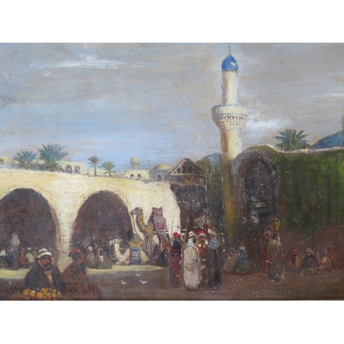 56 - A LATE 19TH / EARLY 20TH CENTURY EASTERN STREET SCENE, with camels and numerous figures, indistinctl... 