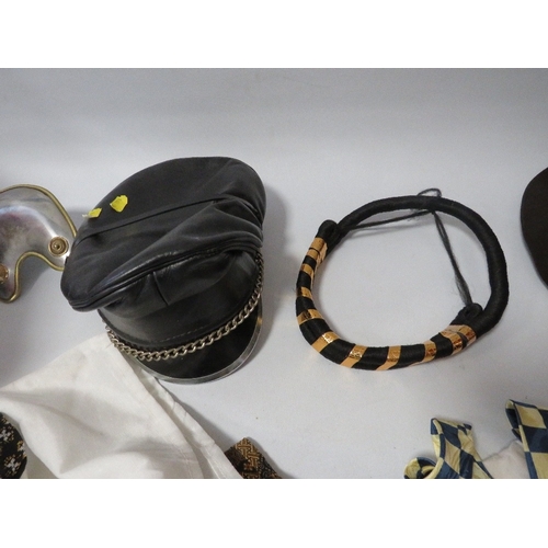 374 - A REPRODUCTION ROMAN CENTURION HELMET TOGETHER WITH A TRAY OF HATS AND ACCESSORIES