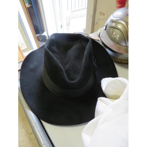 374 - A REPRODUCTION ROMAN CENTURION HELMET TOGETHER WITH A TRAY OF HATS AND ACCESSORIES