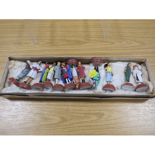 468 - A SELECTION OF TWELVE SUB CONTINENTAL FIGURES