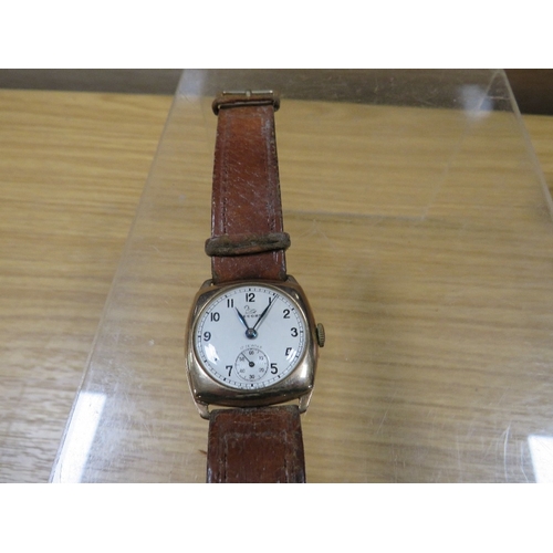 472 - A 9 CARAT GOLD VINTAGE RECORD WRIST WATCH