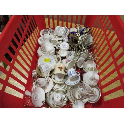 477 - A SMALL TRAY OF MINATURE CUPS AND SAUCERS
