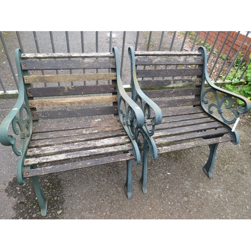 702 - TWO CAST IRON GARDEN CHAIRS