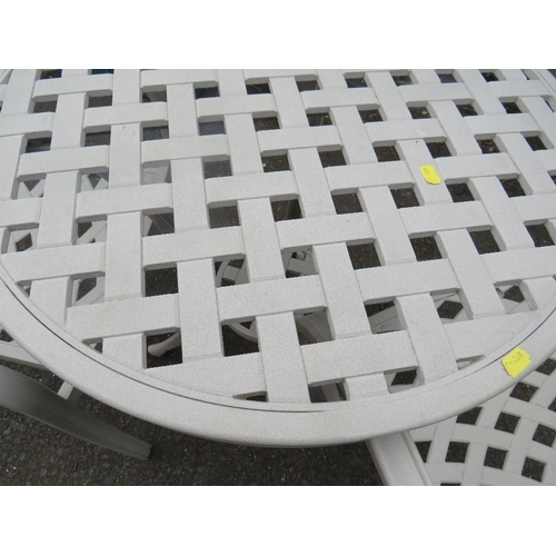704 - A CAST ALUMINIUM THREE PIECE PATIO BISTRO GARDEN SET COMPRISING TABLE & TWO CHAIRS